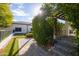 Landscaped backyard with paved patio, built-in grill, and pergola at 509 E Adamanda Ct, Phoenix, AZ 85086