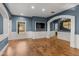 Elegant living room with hardwood floors and a view into the kitchen at 509 E Adamanda Ct, Phoenix, AZ 85086