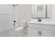 Clean bathroom with white vanity, subway tile shower, and bathtub at 685 E Greenback Dr, San Tan Valley, AZ 85140