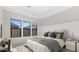 Spacious bedroom with large windows and neutral color palette at 685 E Greenback Dr, San Tan Valley, AZ 85140