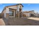 New construction home with stone accents and a 2-car garage at 685 E Greenback Dr, San Tan Valley, AZ 85140