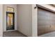 Dark brown garage door and black front door at 685 E Greenback Dr, San Tan Valley, AZ 85140