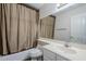 Clean bathroom with shower/tub combo, toilet, and vanity at 6920 E 4Th St # 105, Scottsdale, AZ 85251