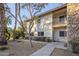 Two-story building with stone accents and walkway at 6920 E 4Th St # 105, Scottsdale, AZ 85251