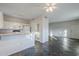 Open kitchen with breakfast bar and tile floors at 6920 E 4Th St # 105, Scottsdale, AZ 85251