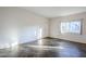 Bright living room with tile floors and large window at 6920 E 4Th St # 105, Scottsdale, AZ 85251