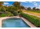 Relaxing pool area overlooking a golf course at 8641 E Clubhouse Way, Scottsdale, AZ 85255