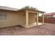 Covered patio with access to backyard at 9163 W Raven Dr, Arizona City, AZ 85123