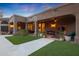 Landscaped backyard with artificial turf and walkway at 9353 N 113Th Way, Scottsdale, AZ 85259