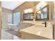 Spa-like bathroom with soaking tub and walk-in shower at 9353 N 113Th Way, Scottsdale, AZ 85259