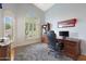 Bright home office with built-in shelving and large windows at 9353 N 113Th Way, Scottsdale, AZ 85259