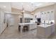 Spacious kitchen boasts white cabinets, a large island, and stainless steel appliances at 9353 N 113Th Way, Scottsdale, AZ 85259