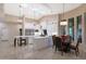 Modern kitchen with white cabinets, large island and breakfast area at 9353 N 113Th Way, Scottsdale, AZ 85259