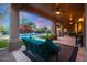 Relaxing patio area with comfortable seating and pool view at 9353 N 113Th Way, Scottsdale, AZ 85259