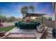 Outdoor patio with fire pit and seating area at 9353 N 113Th Way, Scottsdale, AZ 85259