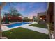 Stunning pool area with lush landscaping at 9353 N 113Th Way, Scottsdale, AZ 85259