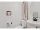 Clean and modern bathroom with white vanity and elegant decor at 9540 E Spiral Ave, Mesa, AZ 85212