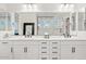 Elegant bathroom with double vanity and modern fixtures at 9540 E Spiral Ave, Mesa, AZ 85212