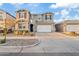 Two-story house with a three-car garage and landscaping at 9540 E Spiral Ave, Mesa, AZ 85212