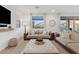 Spacious living area featuring a comfy couch and large windows at 9540 E Spiral Ave, Mesa, AZ 85212