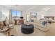 Spacious main bedroom with sitting area, large windows, and plush carpet at 9540 E Spiral Ave, Mesa, AZ 85212