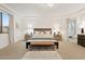 Spacious main bedroom with ensuite bathroom access and stylish decor at 9540 E Spiral Ave, Mesa, AZ 85212