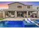 Spacious backyard patio with pool and lounge chairs at 9540 E Spiral Ave, Mesa, AZ 85212