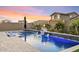 Inviting pool and spa with patio and fire pit at 9540 E Spiral Ave, Mesa, AZ 85212