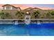 Relaxing pool area with fire pit and water features at 9540 E Spiral Ave, Mesa, AZ 85212