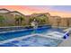 Resort-style pool with spa and fire pit feature at 9540 E Spiral Ave, Mesa, AZ 85212