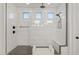 Spa-like shower with glass enclosure and built-in seating at 9540 E Spiral Ave, Mesa, AZ 85212