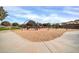 Community playground with swings and play structure at 9825 W Desert Elm Ln, Peoria, AZ 85383