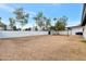 Spacious backyard with trees and gravel at 1015 W Minton Dr, Tempe, AZ 85282