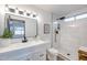 Modern bathroom with white tile and walk-in shower at 1015 W Minton Dr, Tempe, AZ 85282