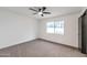 Bright bedroom with neutral carpeting and ceiling fan at 1015 W Minton Dr, Tempe, AZ 85282