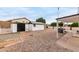 Backyard with storage shed and gravel landscaping at 1031 S 98Th St, Mesa, AZ 85208