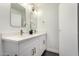 Modern bathroom with dual sinks, updated vanity, and gold fixtures at 1031 S 98Th St, Mesa, AZ 85208