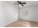 Simple bedroom with a window and ceiling fan at 1031 S 98Th St, Mesa, AZ 85208