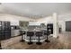 Modern kitchen with large island, granite counters, and stainless steel appliances at 10617 W Adela Dr, Peoria, AZ 85383