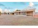 Large backyard with gravel and screened patio at 11440 N Hagen Dr, Sun City, AZ 85351