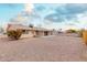 Backyard view of house and surrounding landscape at 11440 N Hagen Dr, Sun City, AZ 85351