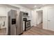 Modern kitchen featuring stainless steel appliances, white cabinets, and a clean design, ready for culinary adventures at 11440 N Hagen Dr, Sun City, AZ 85351