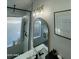 Bathroom with modern fixtures and arched mirror at 1223 E Villa Rita Dr, Phoenix, AZ 85022