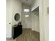 Bright entryway with tile flooring, a console table, and mirror at 1223 E Villa Rita Dr, Phoenix, AZ 85022