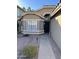 House exterior showcases a walkway to the entrance and landscaping at 1223 E Villa Rita Dr, Phoenix, AZ 85022