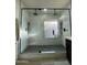 Large walk-in shower with marble tile and glass enclosure at 1223 E Villa Rita Dr, Phoenix, AZ 85022