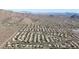 Aerial view of a residential community near mountains at 12605 E Kalil Dr, Scottsdale, AZ 85259