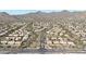 Community overview showing numerous homes and mountain views at 12605 E Kalil Dr, Scottsdale, AZ 85259