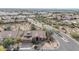 Single-story home with a two-car garage and desert landscaping, nestled in a quiet neighborhood at 12605 E Kalil Dr, Scottsdale, AZ 85259