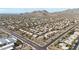 Aerial view of a residential neighborhood with desert landscape at 12605 E Kalil Dr, Scottsdale, AZ 85259